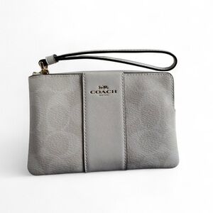 Coach White and Cream Signature Monogrammed Wristlet.